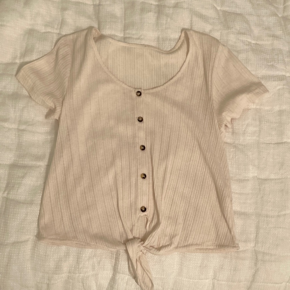White cream button down top with Tie at bottom, from a local boutique, so no tag
